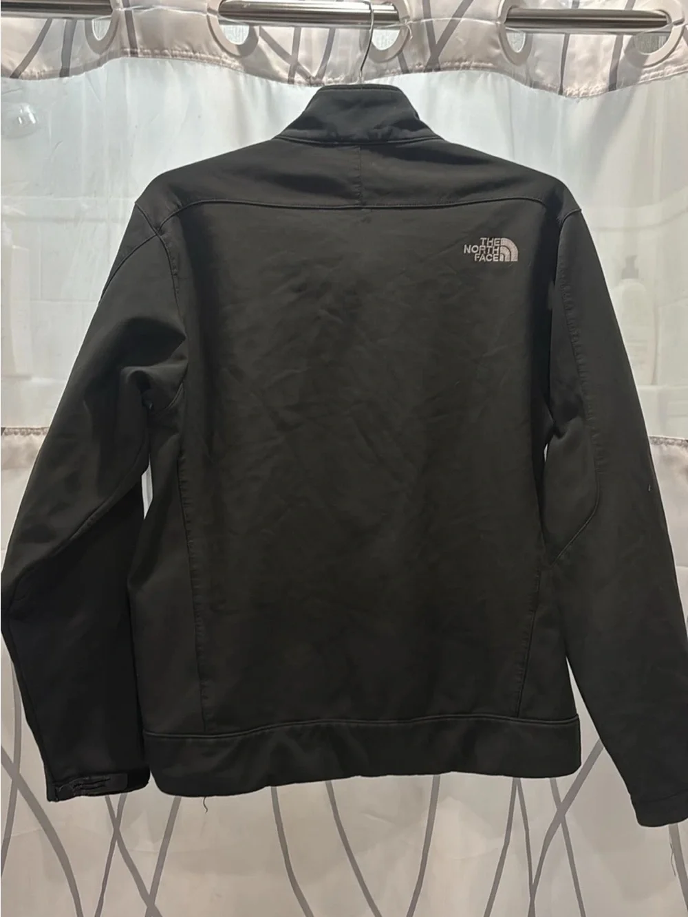 The North Face Black Softshell Jacket with Chest Zip Pocket and Embroidered Logo